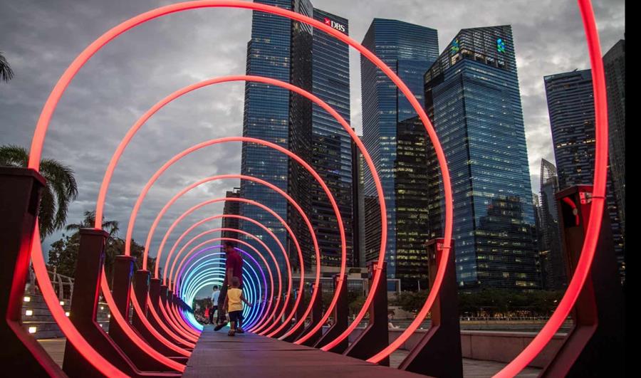 Colorful rings lined up, large enough for people to walk through.