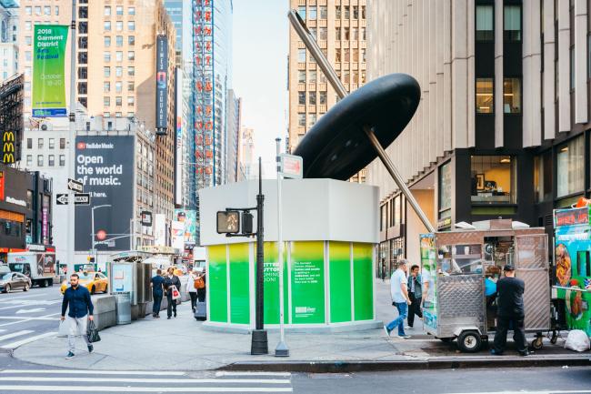 information kiosk and Button & Needle sculpture