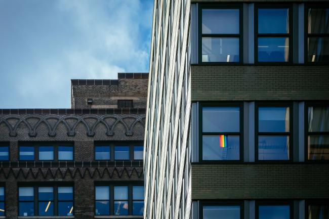 Close up image of two buildings and the sky behind