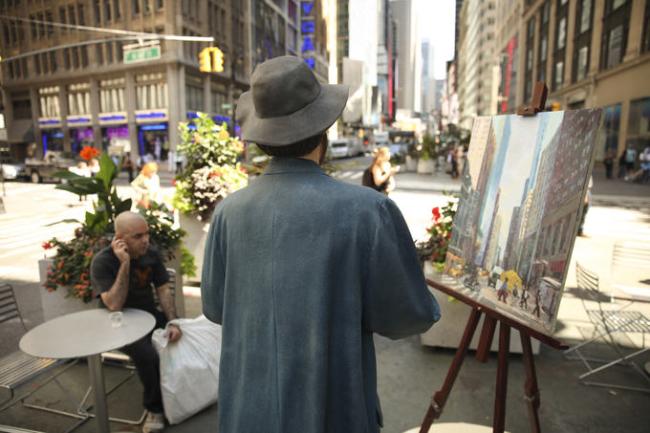 Sculpture of an artist and his easel