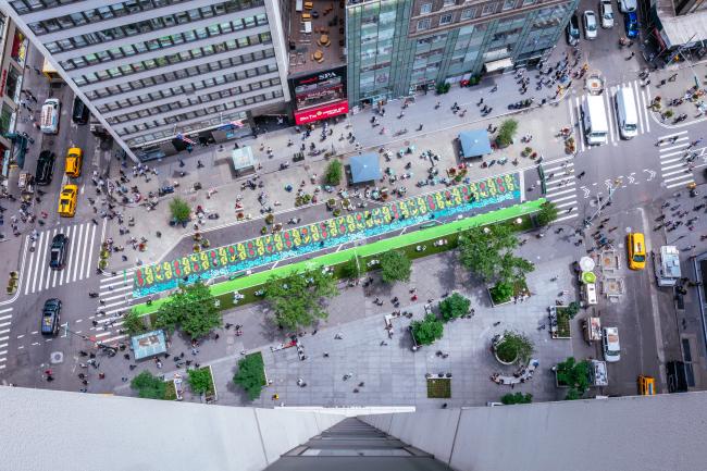 Aerial view of the full block-long street mural, along with surrounding plaza.