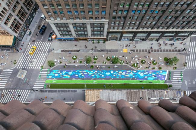 View from the rooftop of the mural painted on the street below