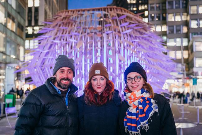 The artists of NEON flanking Frankie Boyle, collaborators on the project