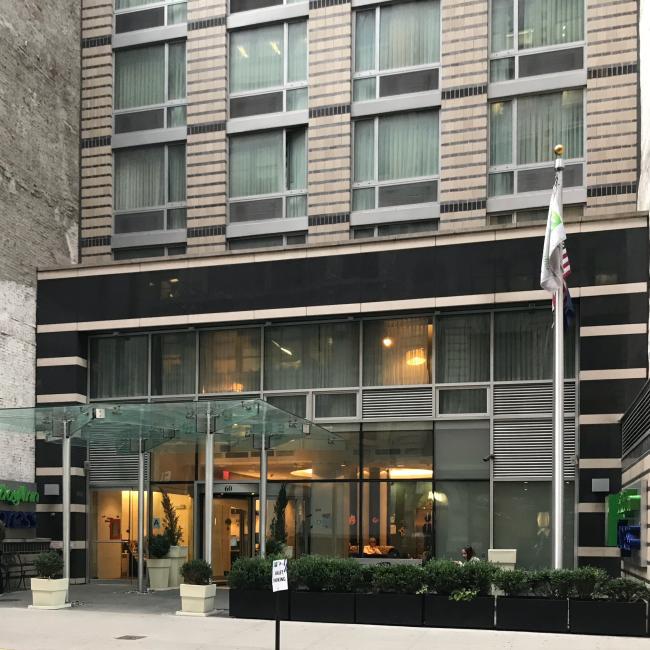 The view of the entrance and patio of the Holiday Inn Express TSS