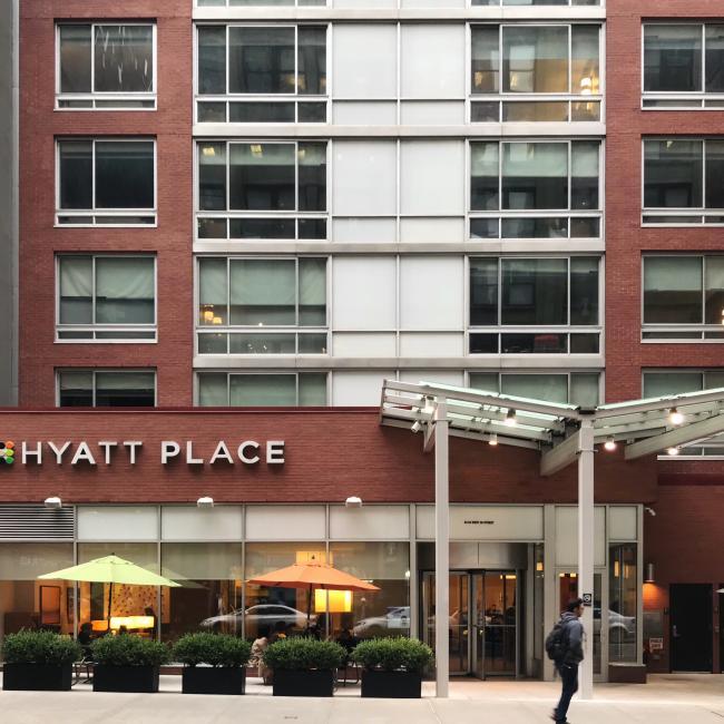 The entrance and plaza to the Hyatt Place Midtown South