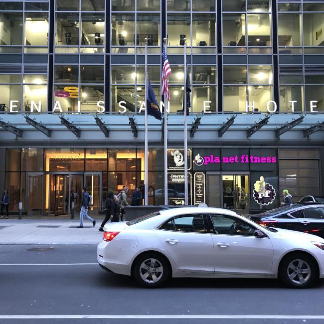 A car out front of the Renaissance Hotel